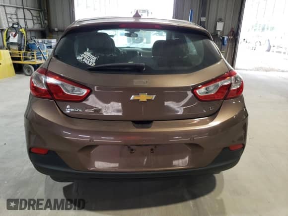 2019 Chevrolet Cruze LT z VIN 3G1BE6SMXKS601742, wystawiony jako Copart lot #69778055 z przebiegiem 86 617 mil mil oraz Szkoda całkowita • Salvage title. Historia ofert i sprzedaży dostępna na DreamBid. Obrazek 6.