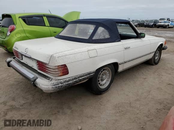 1985 Mercedes-Benz SL с VIN WDBBA45C8FA034429, выставлен на аукционе Copart как лот 76721014 с пробегом 62 006 миль миль и На запчасти • Non repairable. История ставок и продаж доступна на DreamBid. Изображение 3.