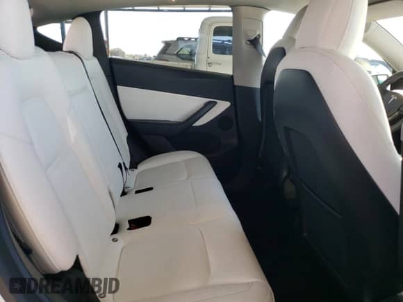 2022 Tesla Model Y Long Range z VIN 7SAYGDEEXNF355456, wystawiony jako Copart lot #85502145 z przebiegiem 62 023 mil mil oraz Szkoda całkowita • Salvage title. Historia ofert i sprzedaży dostępna na DreamBid. Obrazek 10.
