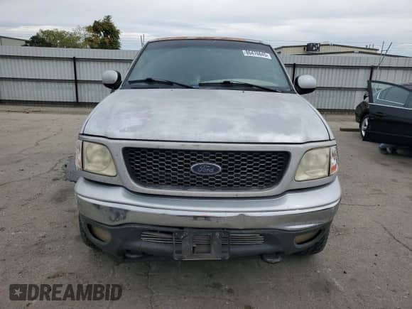 2000 Ford F-150 XL with VIN 1FTRX18W3YNB81000, listed as a Copart auction lot 86476645 with 210,299 mi miles and Salvage title. Bid and sale history available at DreamBid. Image 5.