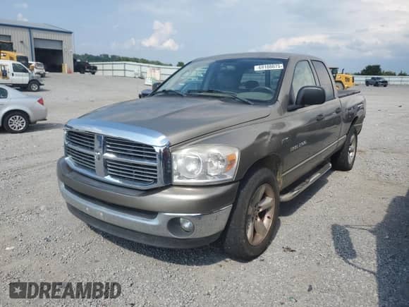 2007 Dodge 1500 SLT with VIN 1D7HA18217J615906, listed as a Copart auction lot 69108075 with 178,914 mi miles and Salvage title. Bid and sale history available at DreamBid. Image 1.