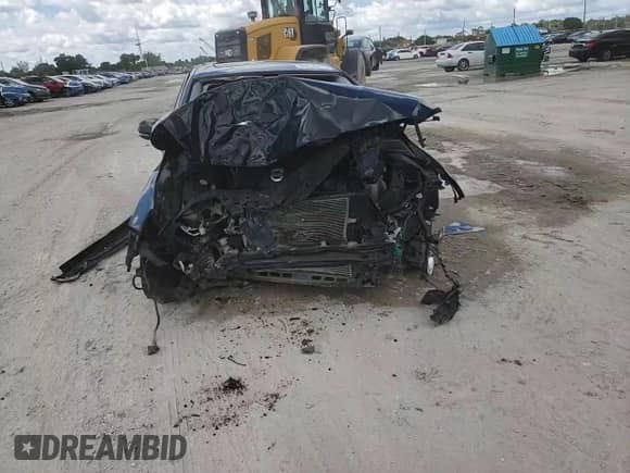 2015 Volvo S60 T5 Drive-E Premier with VIN YV126MFK8F1343062, listed as a Copart auction lot 70910615 with 107,097 mi miles and Salvage title. Bid and sale history available at DreamBid. Image 14.