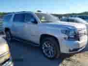 2019 Chevrolet Suburban Premier with VIN 1GNSCJKC0KR293658, listed as a IAAI auction lot 40563834 with 153,619 mi miles and . Bid and sale history available at DreamBid. Image 13.