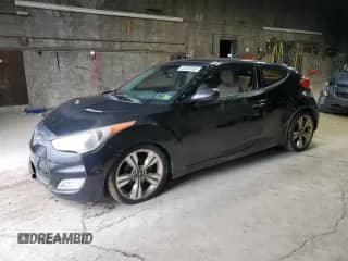 2012 Hyundai Veloster w/Red Int z VIN KMHTC6AD4CU053835, wystawiony jako Copart lot #82660695 z przebiegiem 176 036 mil mil oraz Szkoda całkowita • Salvage title. Historia ofert i sprzedaży dostępna na DreamBid. Obrazek 1.