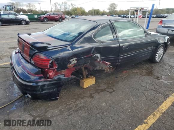 2001 Pontiac Grand Am с VIN 1G2NF12T71M540199, выставлен на аукционе Copart как лот 58686335 с пробегом 110 886 миль миль и На запчасти • Non repairable. История ставок и продаж доступна на DreamBid. Изображение 3.