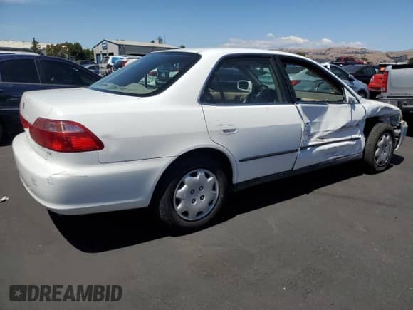 1999 Honda Accord LX с VIN JHMCG665XXC003882, выставлен на аукционе Copart как лот 66410515 с пробегом 137 491 миль миль и Списание • Salvage title. История ставок и продаж доступна на DreamBid. Изображение 3.