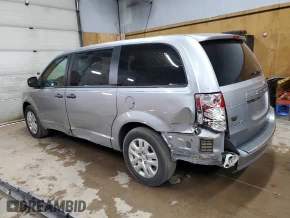 2019 Dodge Grand Caravan SE Plus with VIN 2C4RDGBG9KR587192, listed as a Copart auction lot 63755325 with 64,794 mi miles and Salvage title. Bid and sale history available at DreamBid. Image 2.
