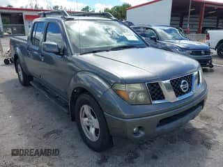 2007 Nissan Frontier SE with VIN 1N6AD09U57C406389, listed as a IAAI auction lot 43268541 with 214,542 mi miles and . Bid and sale history available at DreamBid. Image 1.