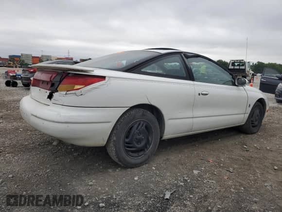 1998 Saturn SC z VIN 1G8ZH1270WZ108164, wystawiony jako Copart lot #65145955 z przebiegiem 169 421 mil mil oraz Szkoda całkowita • Salvage title. Historia ofert i sprzedaży dostępna na DreamBid. Obrazek 3.