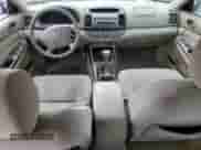 2005 Toyota Camry LE с VIN 4T1BE30K25U061357, выставлен на аукционе Copart как лот 85748425 с пробегом 198 638 миль миль и Списание • Salvage title. История ставок и продаж доступна на DreamBid. Изображение 8.