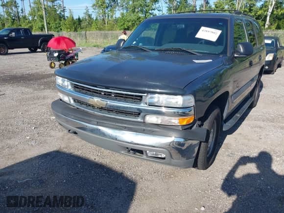 2002 Chevrolet Tahoe LS with VIN 1GNEC13Z92R120334, listed as a IAAI auction lot 42897802 with 125,820 mi miles and . Bid and sale history available at DreamBid. Image 6.