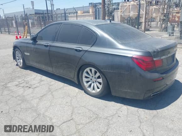 2013 BMW 7 Series 750i with VIN WBAYA8C57DC996601, listed as a IAAI auction lot 42497017 with 137,222 mi miles and . Bid and sale history available at DreamBid. Image 3.