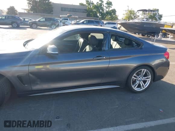 2014 BMW 4 Series 428i z VIN WBA3N7C57EK220498, wystawiony jako IAAI lot #42608688 z przebiegiem 157 523 mil mil oraz . Historia ofert i sprzedaży dostępna na DreamBid. Obrazek 6.