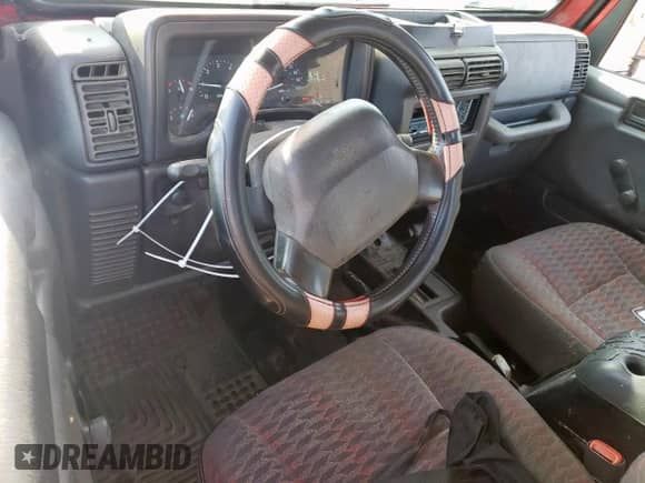 2000 Jeep Wrangler SE with VIN 1J4FA29P6YP703375, listed as a Copart auction lot 66914735 with 174,624 mi miles and Salvage title. Bid and sale history available at DreamBid. Image 8.