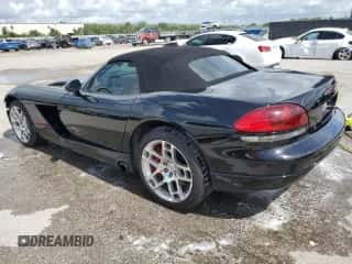 2003 Dodge Viper SRT-10 with VIN 1B3JR65Z43V500286, listed as a Copart auction lot 62396915 with 62,198 mi miles and Salvage title. Bid and sale history available at DreamBid. Image 2.