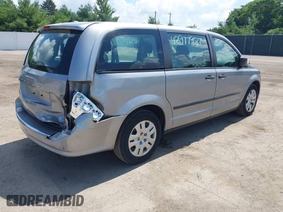2016 Dodge Grand Caravan SE with VIN 2C4RDGBG7GR348621, listed as a IAAI auction lot 42977987 with 94,483 mi miles and . Bid and sale history available at DreamBid. Image 4.