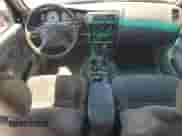 2002 Toyota Tacoma PreRunner z VIN 5TEGM92N62Z118802, wystawiony jako Copart lot #66684755 z przebiegiem 216 147 mil mil oraz Szkoda całkowita • Salvage title. Historia ofert i sprzedaży dostępna na DreamBid. Obrazek 8.
