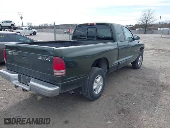 1997 Dodge Dakota z VIN 1B7GG23X1VS211394, wystawiony jako IAAI lot #41723088 z przebiegiem 124 104 mil mil oraz . Historia ofert i sprzedaży dostępna na DreamBid. Obrazek 4.