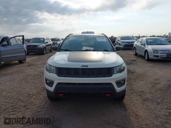 2018 Jeep Compass Trailhawk z VIN 3C4NJDDB8JT234574, wystawiony jako IAAI lot #43049041 z przebiegiem 93 968 mil mil oraz . Historia ofert i sprzedaży dostępna na DreamBid. Obrazek 12.
