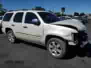 2011 Chevrolet Tahoe LTZ with VIN 1GNSKCE08BR225673, listed as a Copart auction lot 82283985 with 108,396 mi miles and Salvage title. Bid and sale history available at DreamBid. Image 4.