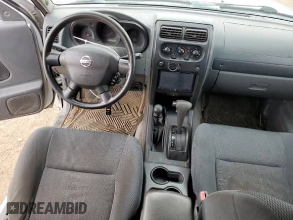 2003 Nissan Frontier SVE with VIN 1N6MD29Y83C457312, listed as a Copart auction lot 79390474 with 119,904 mi miles and Salvage title. Bid and sale history available at DreamBid. Image 8.