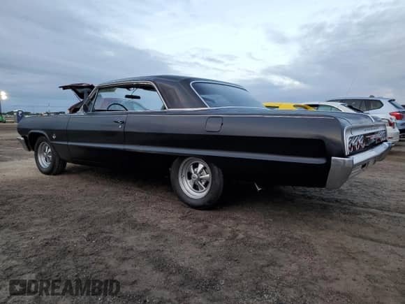 1964 Chevrolet Impala z VIN 41447Y159989, wystawiony jako Copart lot #75836714 z przebiegiem Nie podano mil oraz Szkoda całkowita • Salvage title. Historia ofert i sprzedaży dostępna na DreamBid. Obrazek 2.