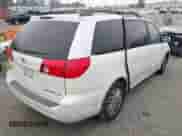 2009 Toyota Sienna XLE with VIN 5TDZK22C19S235473, listed as a IAAI auction lot 43376158 with 110,574 mi miles and . Bid and sale history available at DreamBid. Image 4.