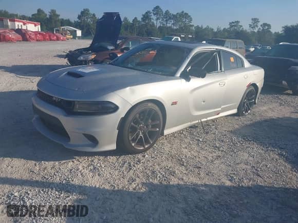 2023 Dodge Charger Scat Pack z VIN 2C3CDXGJ2PH651097, wystawiony jako IAAI lot #43270783 z przebiegiem 41 278 mil mil oraz . Historia ofert i sprzedaży dostępna na DreamBid. Obrazek 2.