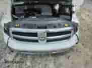 2018 Ram 1500 SLT z VIN 1C6RR6GG8JS303768, wystawiony jako Copart lot #61127565 z przebiegiem 230 959 mil mil oraz Szkoda całkowita • Salvage title. Historia ofert i sprzedaży dostępna na DreamBid. Obrazek 11.