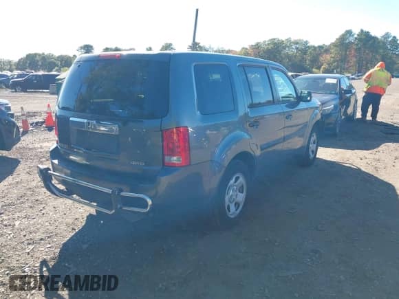 2013 Honda Pilot LX with VIN 5FNYF4H25DB074181, listed as a IAAI auction lot 43408288 with 82,921 mi miles and . Bid and sale history available at DreamBid. Image 4.