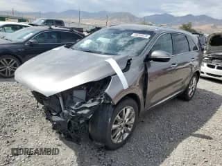2016 Kia Sorento SXL z VIN 5XYPKDA54GG079252, wystawiony jako Copart lot #69244475 z przebiegiem 99 943 mil mil oraz Szkoda całkowita • Salvage title. Historia ofert i sprzedaży dostępna na DreamBid. Obrazek 1.