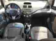2013 Chevrolet Spark LS с VIN KL8CA6S99DC525077, выставлен на аукционе Copart как лот 54673835 с пробегом 152 726 миль миль и Списание • Salvage title. История ставок и продаж доступна на DreamBid. Изображение 8.