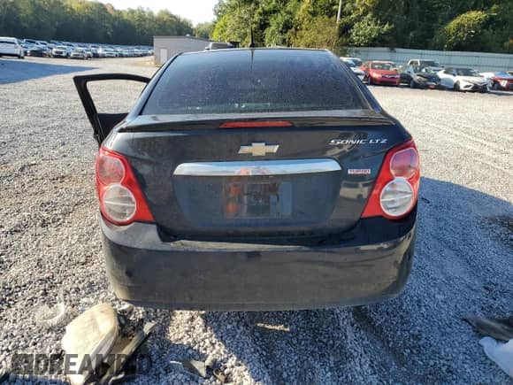 2014 Chevrolet Sonic LTZ с VIN 1G1JE5SB1E4177635, выставлен на аукционе Copart как лот 84280825 с пробегом Не указан миль и Списание • Salvage title. История ставок и продаж доступна на DreamBid. Изображение 6.