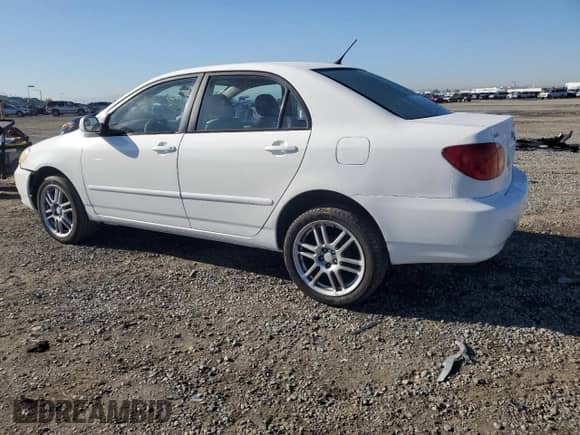 2003 Toyota Corolla LE with VIN 1NXBR32E83Z118296, listed as a Copart auction lot 82462505 with 155,356 mi miles and Salvage title. Bid and sale history available at DreamBid. Image 2.