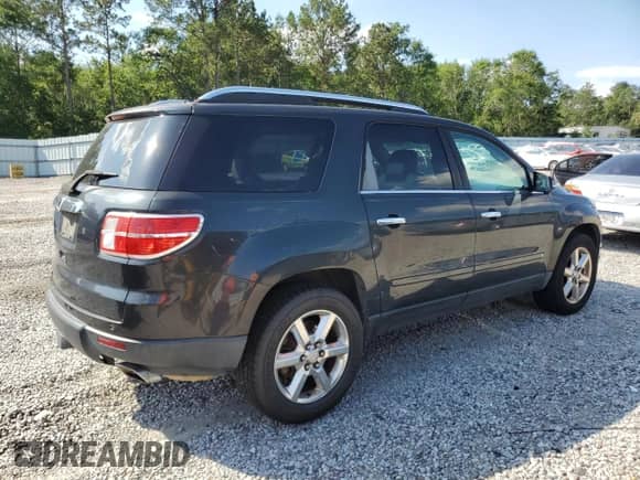 2007 Saturn Outlook XR with VIN 5GZER33747J116083, listed as a Copart auction lot 57983325 with 214,792 mi miles and Clean title. Bid and sale history available at DreamBid. Image 3.