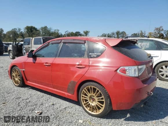 2009 Subaru WRX STI with VIN JF1GR89699L826521, listed as a Copart auction lot 74781604 with 198,228 mi miles and Salvage title. Bid and sale history available at DreamBid. Image 2.