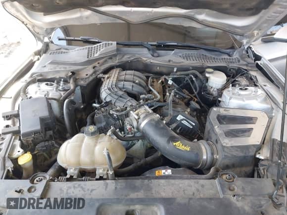 2016 Ford Mustang V6 z VIN 1FA6P8AM3G5206714, wystawiony jako IAAI lot #43283378 z przebiegiem 129 876 mil mil oraz . Historia ofert i sprzedaży dostępna na DreamBid. Obrazek 10.