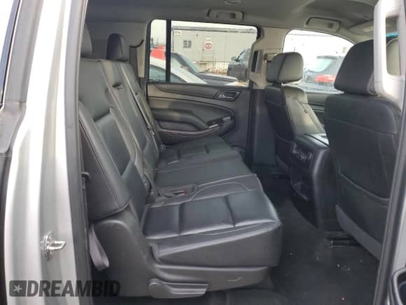 2018 Chevrolet Suburban LT z VIN 1GNSCHKCXJR332103, wystawiony jako Copart lot #82861393 z przebiegiem 143 607 mil mil oraz . Historia ofert i sprzedaży dostępna na DreamBid. Obrazek 11.