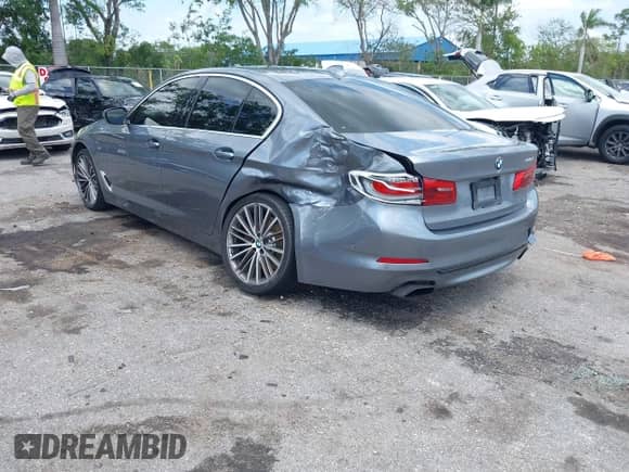 2019 BMW 5 Series 540i with VIN WBAJE5C51KBM76918, listed as a IAAI auction lot 42000228 with 59,670 mi miles and . Bid and sale history available at DreamBid. Image 3.
