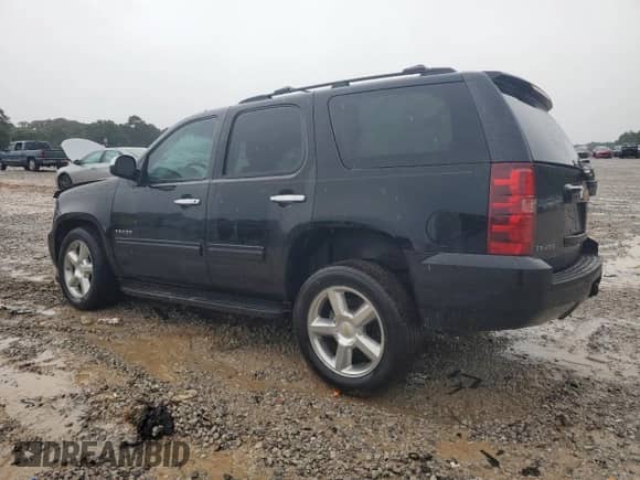 2011 Chevrolet Tahoe LS z VIN 1GNSCAE04BR398186, wystawiony jako Copart lot #62933735 z przebiegiem 195 635 mil mil oraz Szkoda całkowita • Salvage title. Historia ofert i sprzedaży dostępna na DreamBid. Obrazek 2.