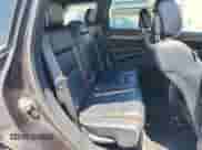 2015 Jeep Grand Cherokee High Altitude z VIN 1C4RJFCM5FC855631, wystawiony jako Copart lot #66723425 z przebiegiem 136 237 mil mil oraz Szkoda całkowita • Salvage title. Historia ofert i sprzedaży dostępna na DreamBid. Obrazek 11.