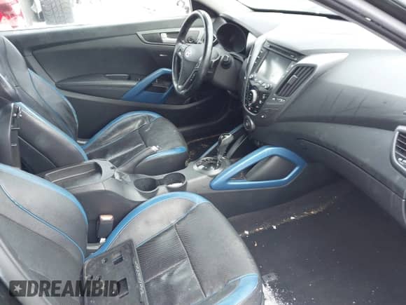 2014 Hyundai Veloster Turbo with VIN KMHTC6AE3EU189370, listed as a IAAI auction lot 41227179 with 103,432 mi miles and . Bid and sale history available at DreamBid. Image 5.