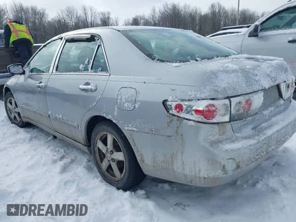 2003 Honda Accord EX z VIN 1HGCM556X3A000230, wystawiony jako IAAI lot #41472952 z przebiegiem 199 500 mil mil oraz . Historia ofert i sprzedaży dostępna na DreamBid. Obrazek 3.