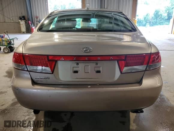 2007 Hyundai Azera GLS z VIN KMHFC46D57A209656, wystawiony jako Copart lot #61569745 z przebiegiem 149 960 mil mil oraz Szkoda całkowita • Salvage title. Historia ofert i sprzedaży dostępna na DreamBid. Obrazek 6.