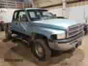 1996 Dodge 2500 with VIN 3B7KF23W5TM144194, listed as a Copart auction lot 70540684 with 123,234 mi miles and Salvage title. Bid and sale history available at DreamBid. Image 4.
