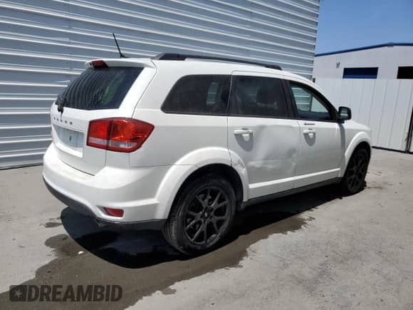 2018 Dodge Journey SXT с VIN 3C4PDCBG7JT322802, выставлен на аукционе Copart как лот 59688875 с пробегом 99 999 миль миль и Чистый • Clean title. История ставок и продаж доступна на DreamBid. Изображение 3.