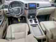 2016 Honda Pilot EX-L z VIN 5FNYF6H58GB057384, wystawiony jako Copart lot #70254655 z przebiegiem 136 481 mil mil oraz Czysty tytuł • Clean title. Historia ofert i sprzedaży dostępna na DreamBid. Obrazek 8.