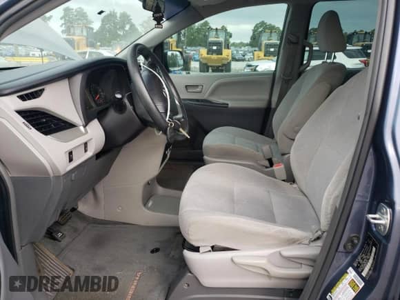 2016 Toyota Sienna L with VIN 5TDZK3DC8GS734433, listed as a Copart auction lot 68737615 with 142,007 mi miles and Salvage title. Bid and sale history available at DreamBid. Image 7.