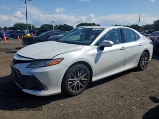 2022 Toyota Camry XLE with VIN 4T1F11BK3NU067490, listed as a Copart auction lot 80638205 with 85,052 mi miles and Salvage title. Bid and sale history available at DreamBid. Image 1.