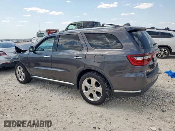2015 Dodge Durango SXT with VIN 1C4RDHAG2FC946386, listed as a Copart auction lot 67964665 with 113,122 mi miles and Salvage title. Bid and sale history available at DreamBid. Image 2.